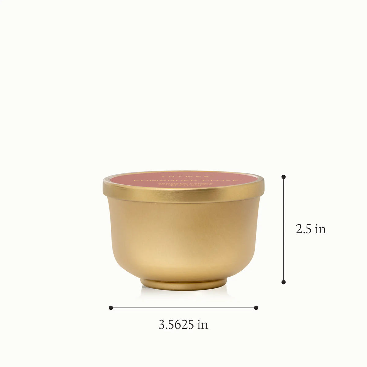 A metallic, gold finish candle tin with a height of 2.5 inches and a diameter of 3.5625 inches