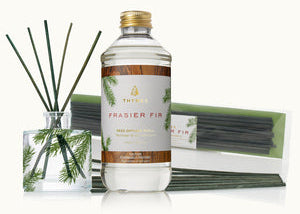 Frasier Fir diffuser set with bottle, sticks, and packaging on a white background